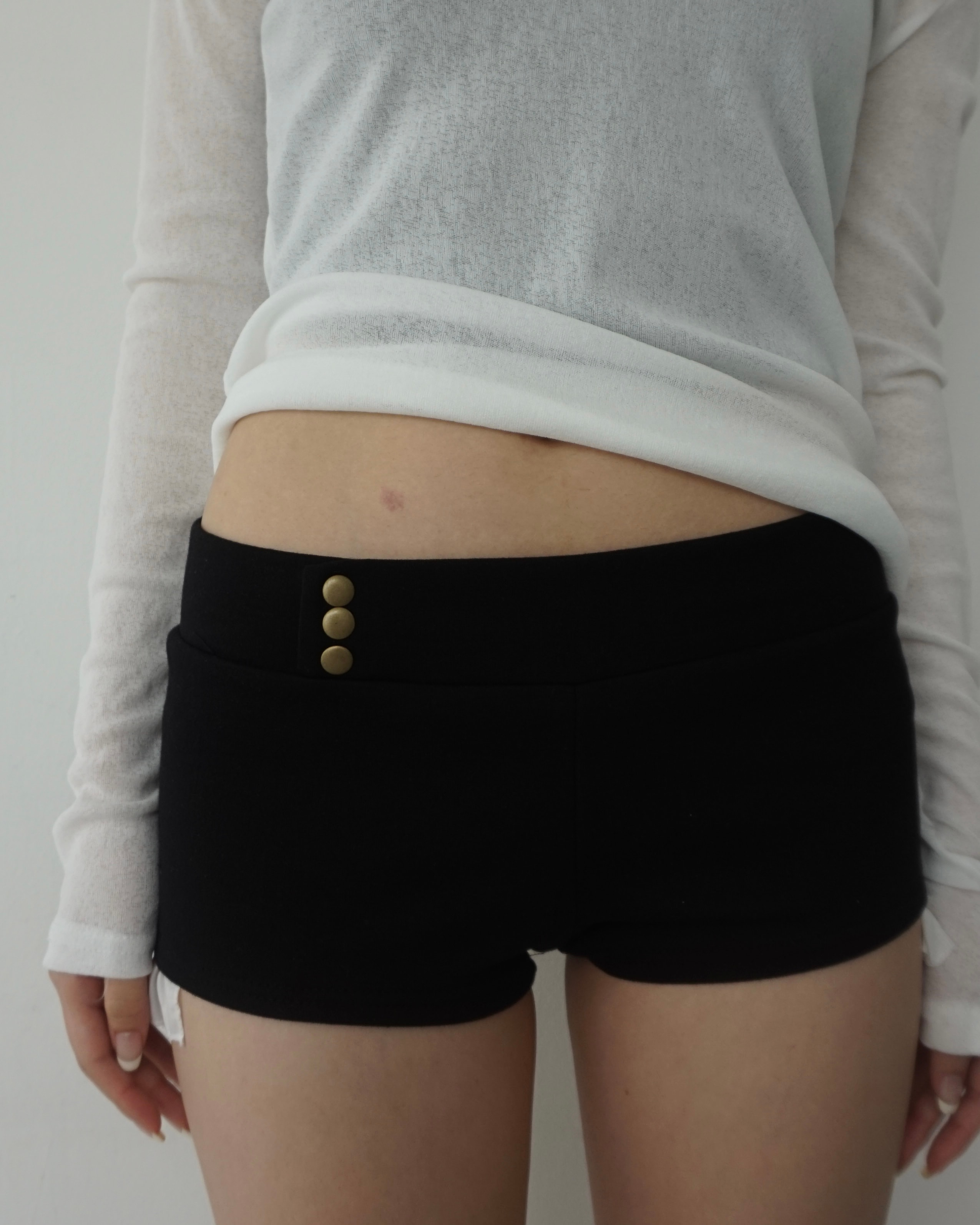 Button frill shorts