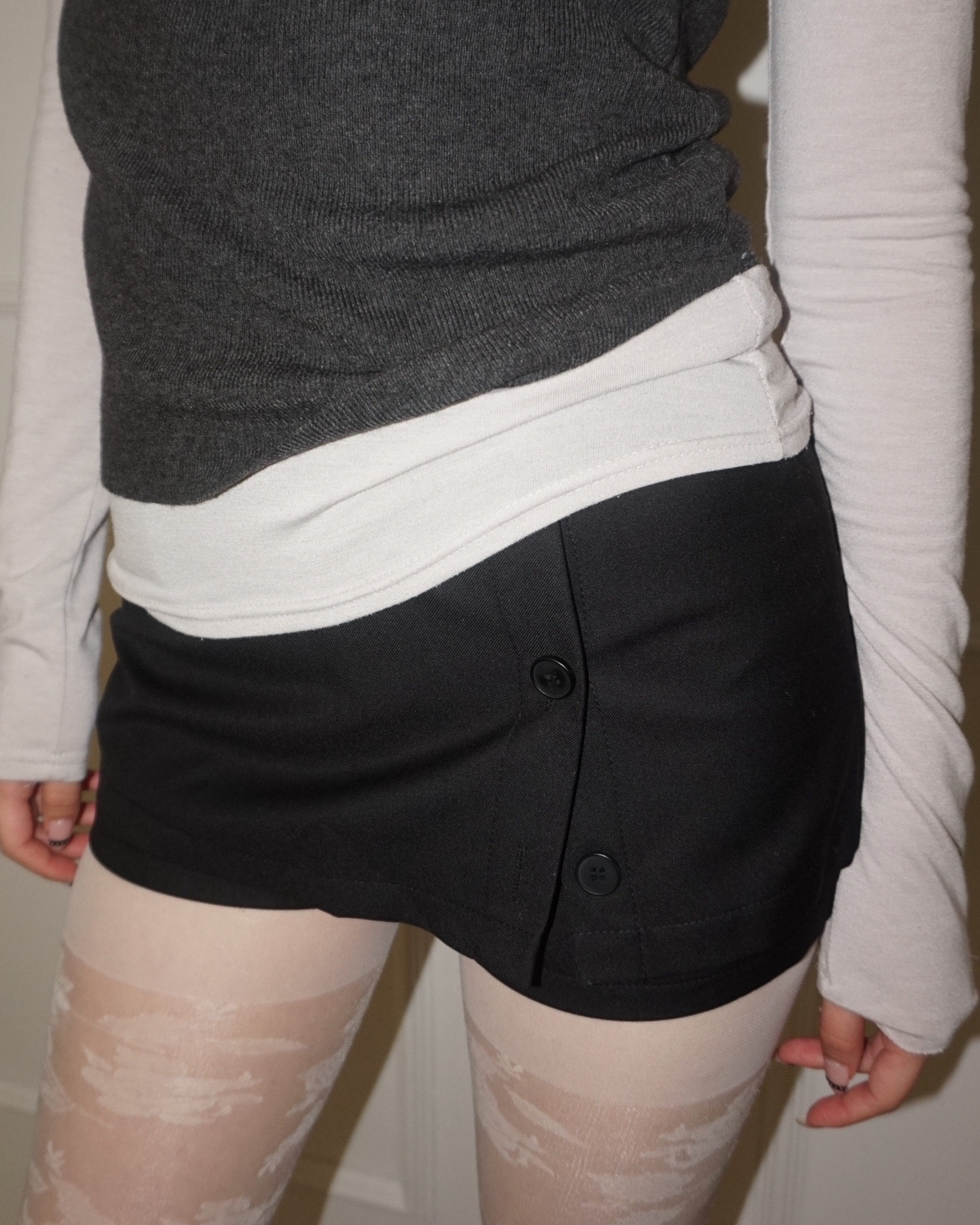 Side button mini skirt