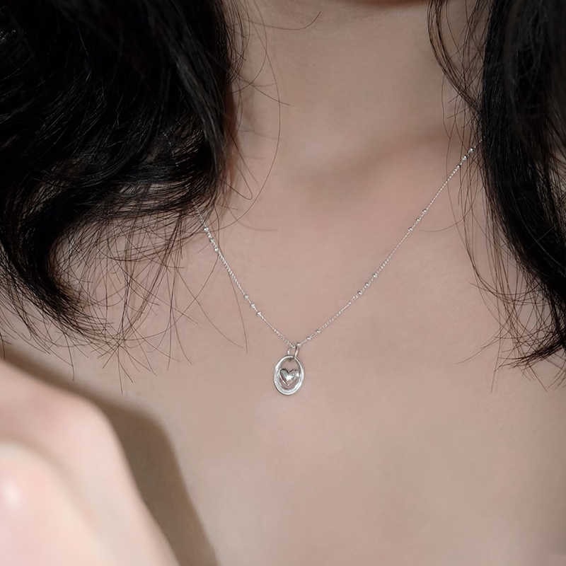 Nimbus heart pendant