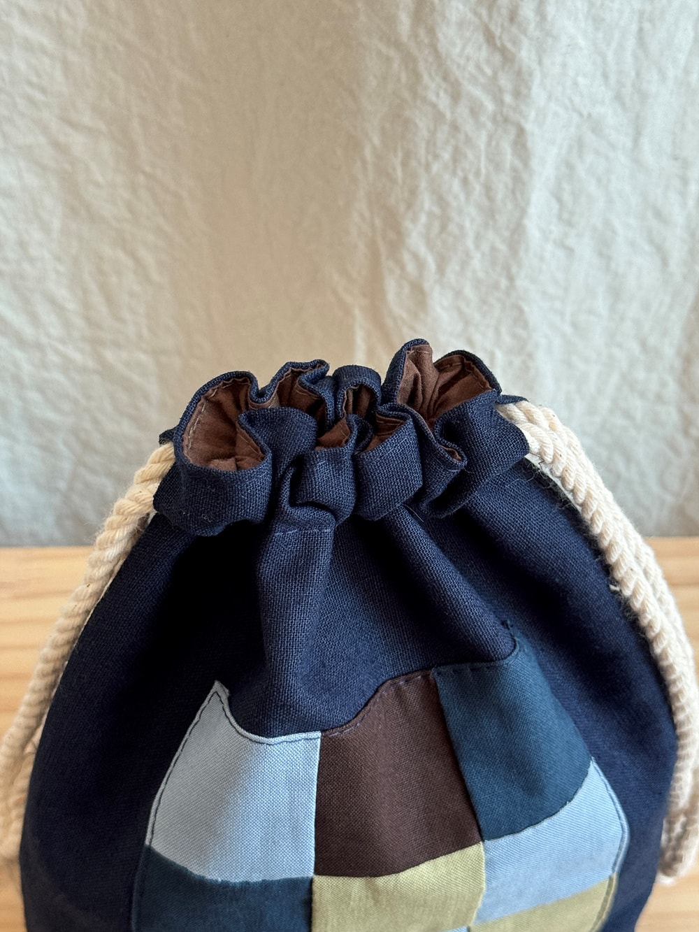 [공식몰 한정] Piece by piece String pouch Navy
