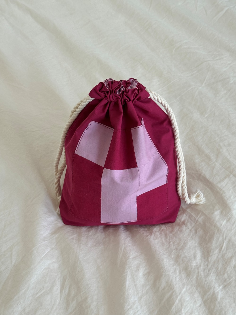 [공식몰 한정] Piece by piece String pouch Pink