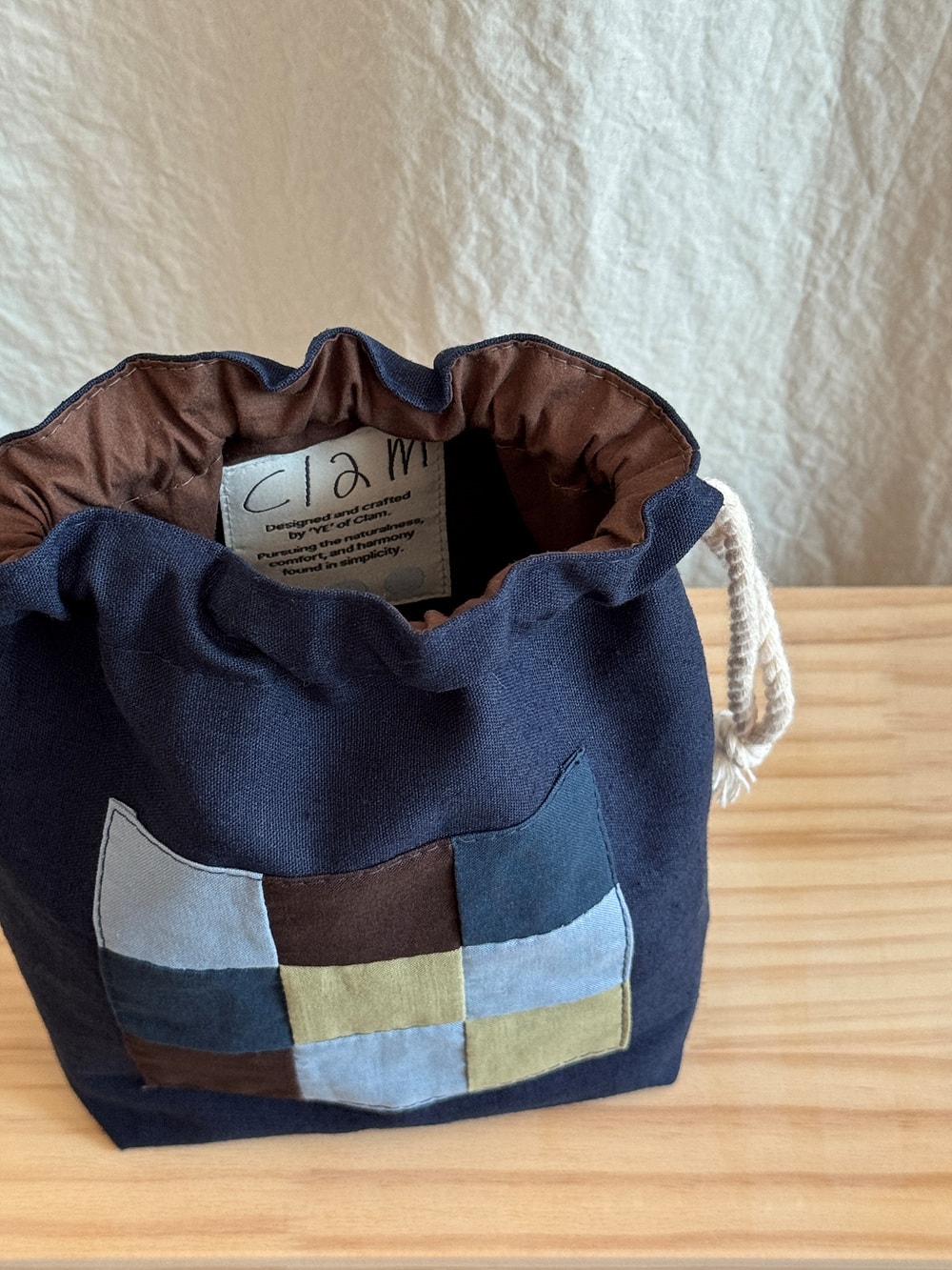 [공식몰 한정] Piece by piece String pouch Navy