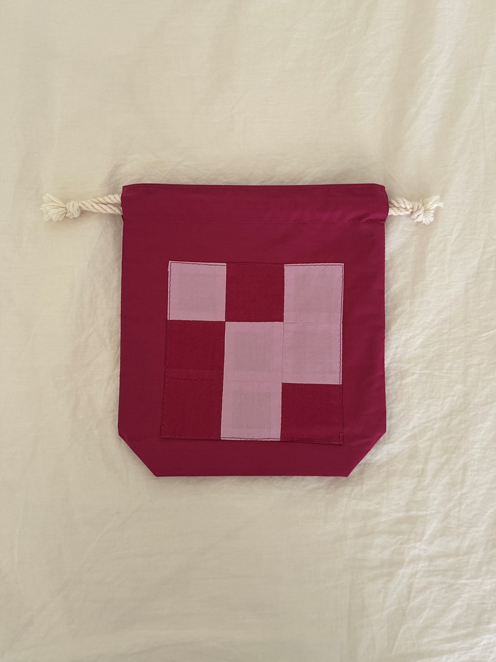 [공식몰 한정] Piece by piece String pouch Pink
