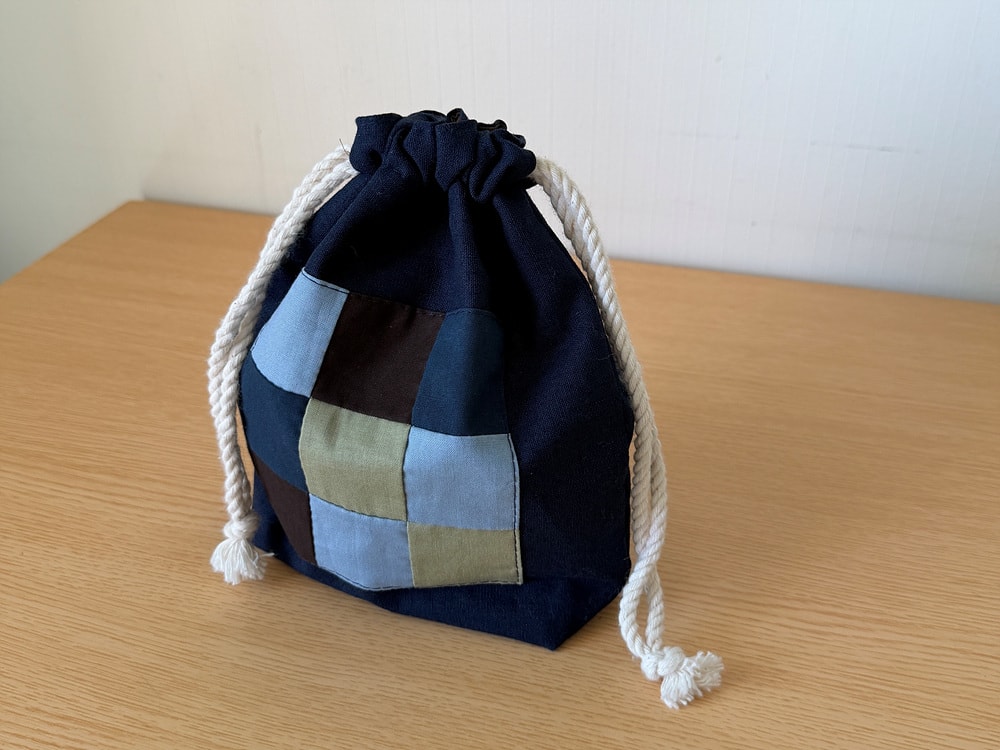 [공식몰 한정] Piece by piece String pouch Navy