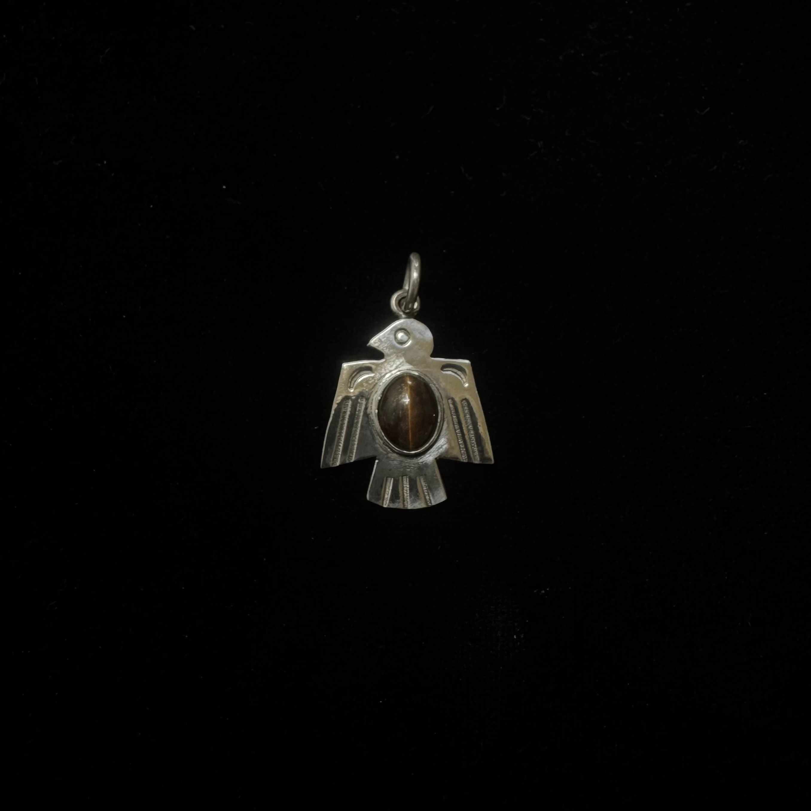 Natural Tiger's Eye stone thunderbird pendant