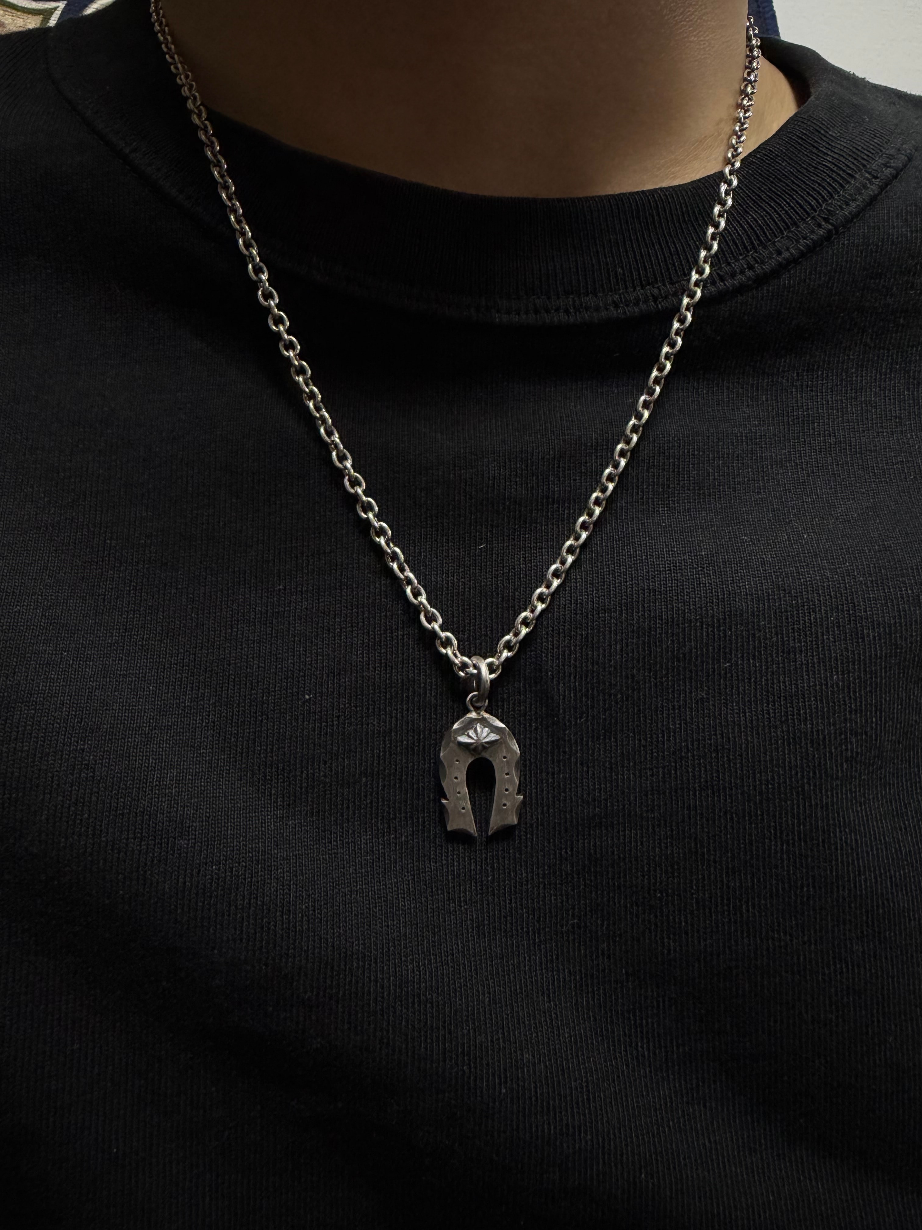 Horseshoe concho pendant