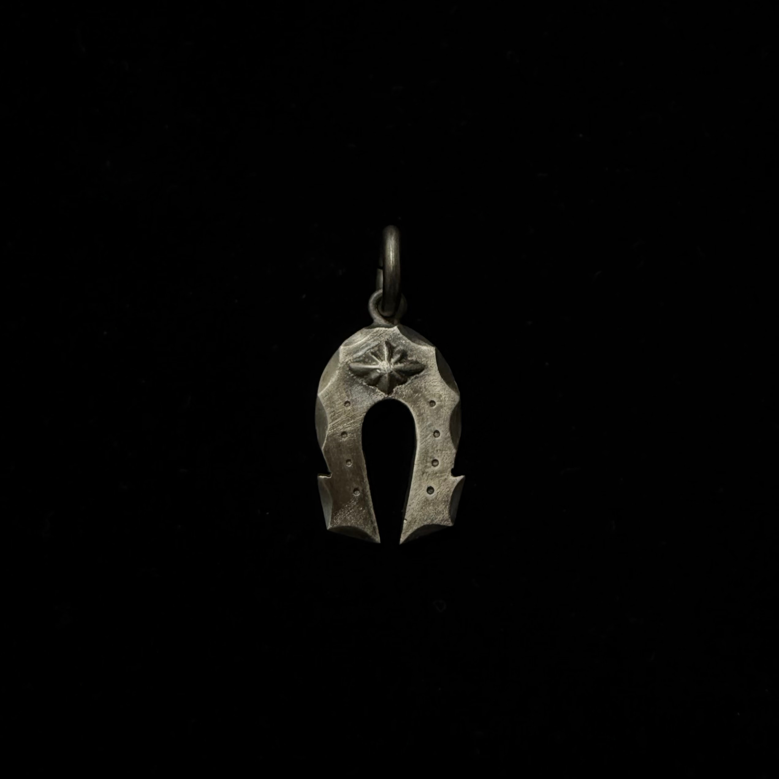 Horseshoe concho pendant