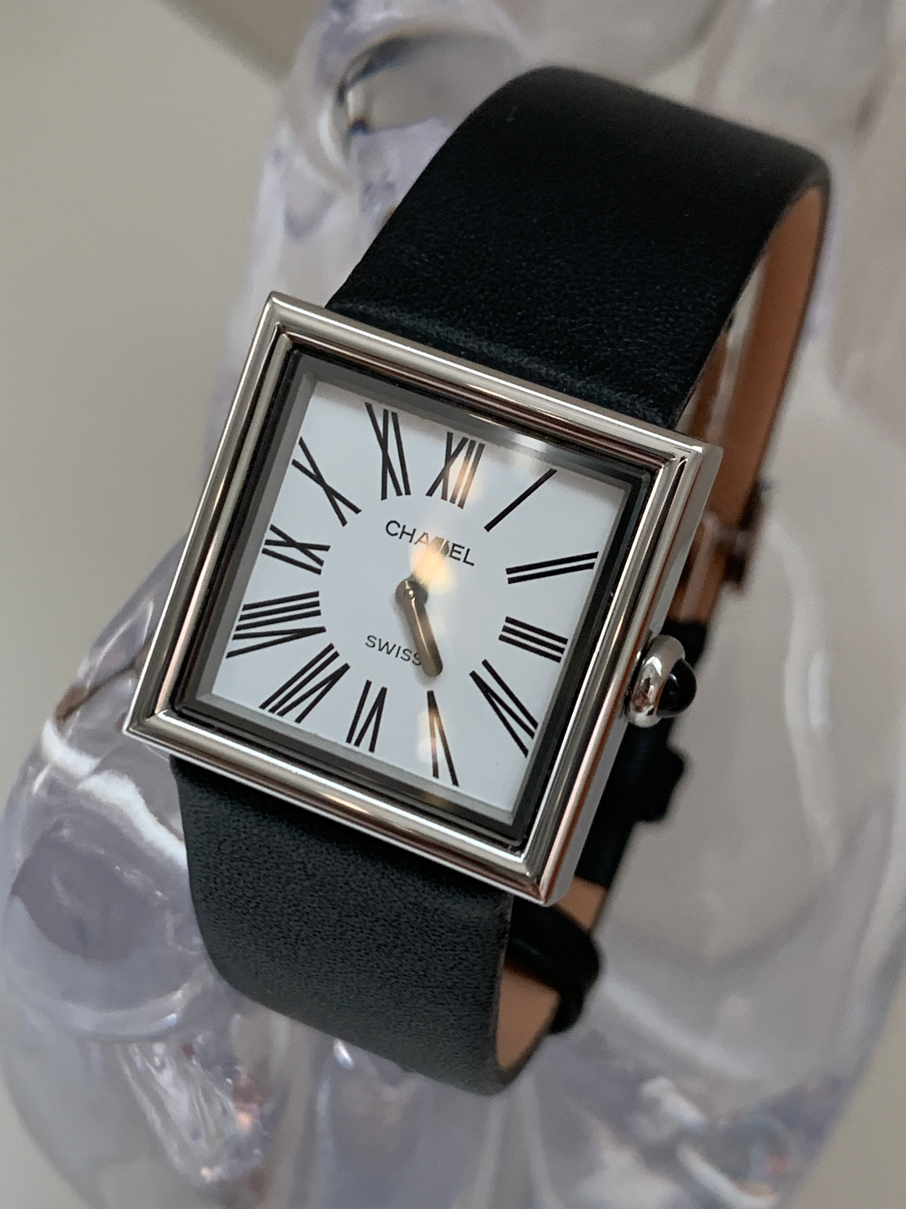 Chanel mademoiselle white dial watch
