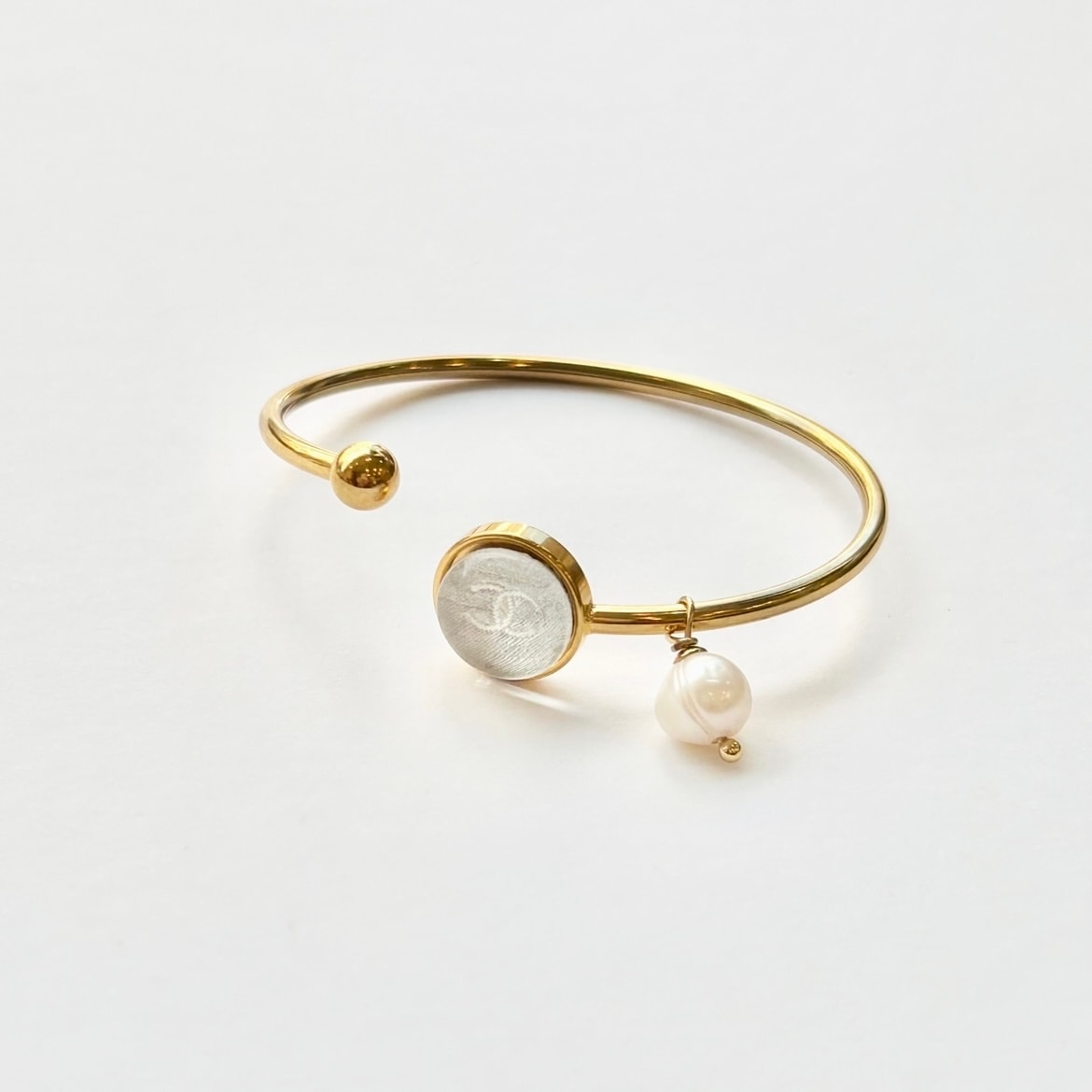 gold ball & silver cc pearl drop bangle