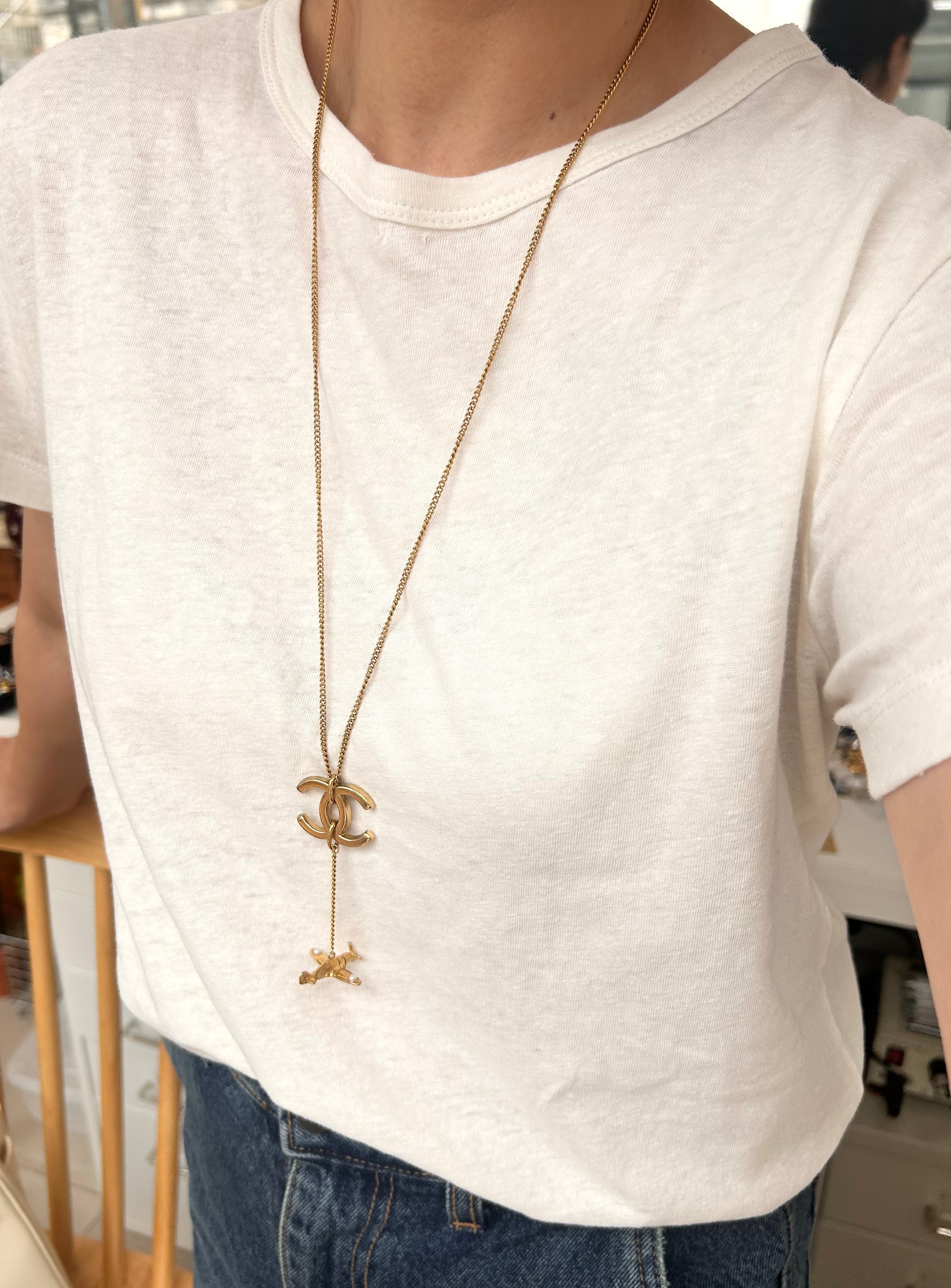 hanger CC airplane drop necklace